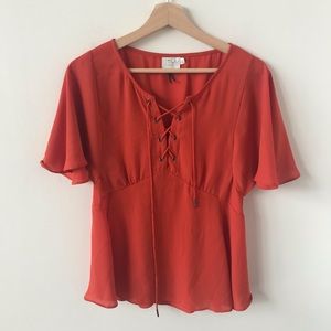 HD in Paris orange tie front blouse